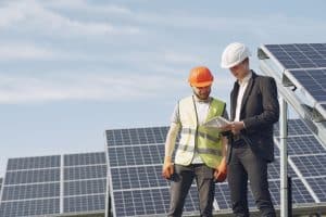 Foreman And Businessman At Solar Energy Station 1 300x200
